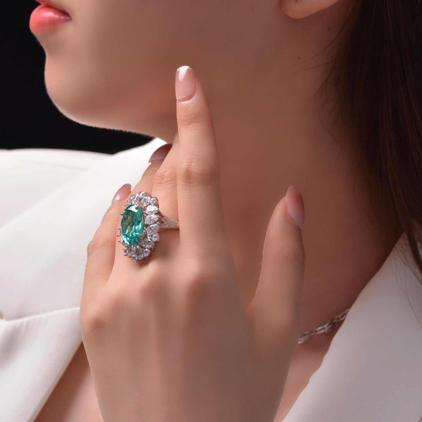 7 carat egg-shaped Paraiba green 1216 ring